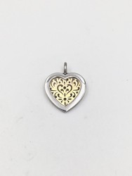 Colgante Finor de plata y oro con forma de corazón.
