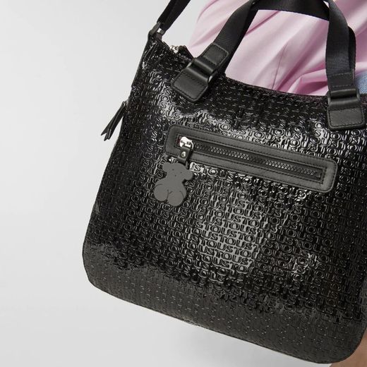 Tous schwarze wasserabweisende Vinyltasche aus Lackleder