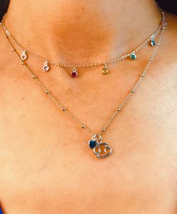 Colgante de plata con signo zodiacal Cáncer y corazón azul marino