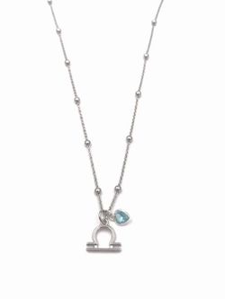 Colgante de plata con signo zodiacal Libra y corazón azul claro