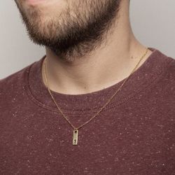 Langer vergoldeter Silberanhänger mit durchbrochenem Schlüssel