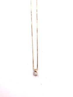 Colgante oro cuatro grapas diamante