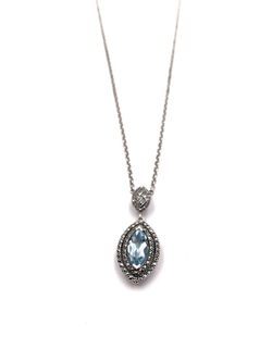 Colgante Oval en plata de ley y Topacio