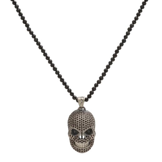 Spektakulärer Anhänger mit einem mit schwarzen Zirkonen besetzten Totenkopf und einer Schnur aus Onyx.