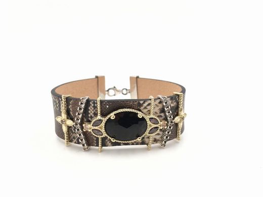 Espectacular pulsera con stamping serpiente y cuarzo fume