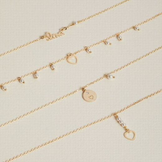 Vergoldeter Halsreif aus Sterlingsilber mit Perlen und durchbrochenem Herz