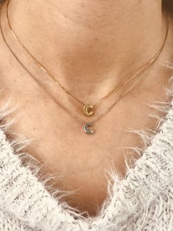 Initialen aus 18 Karat Weißgold mit Brillanten