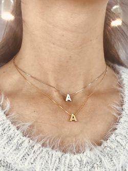 Initialen aus 18 Karat Weißgold mit Brillanten