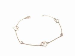 Pulseira de ouro com corações e zircônias