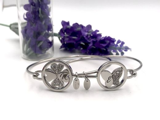 Pulsera rígida de lotus en acero con Trébol