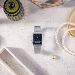 Reloj Casio unisex doble uso horario con esfera negra