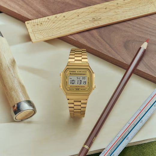 Montre en or unisexe vintage numérique Casio, cadran en or