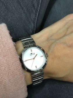 Reloj lotus de mujer en acero con esfera blanca y signos rosados