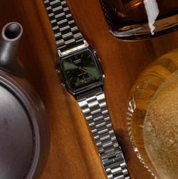 Montre Casio unisexe analogique-numérique AQ-230 avec cadran vert foncé