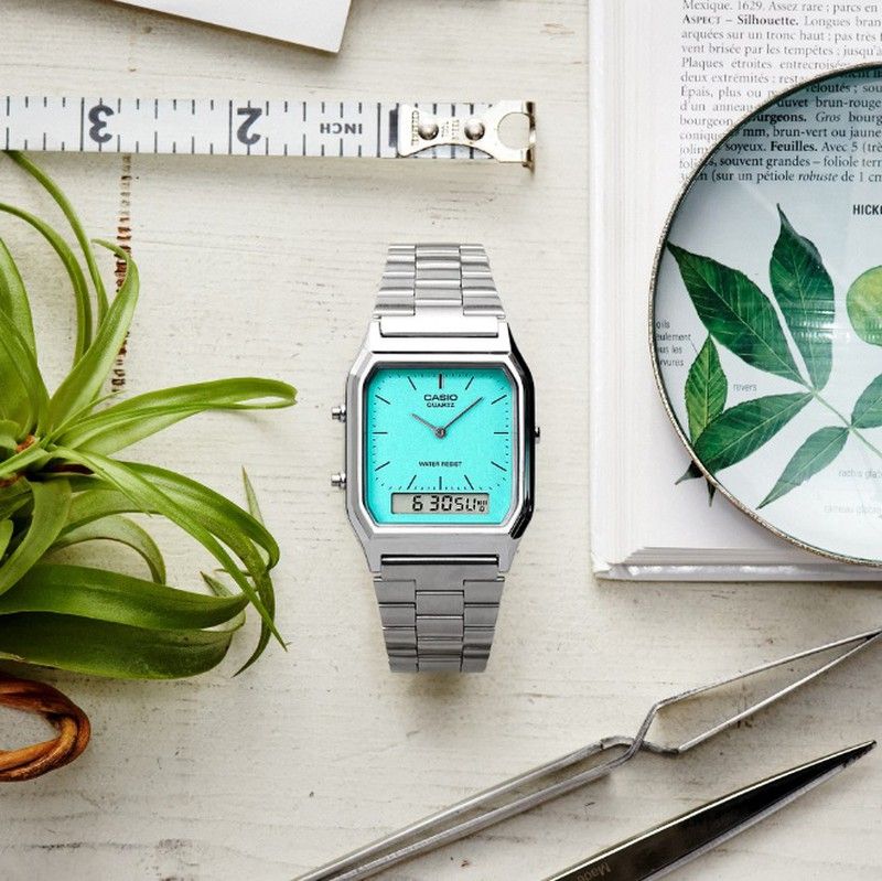 Reloj unisex Casio analógico-digital azul turquesa AQ-230A